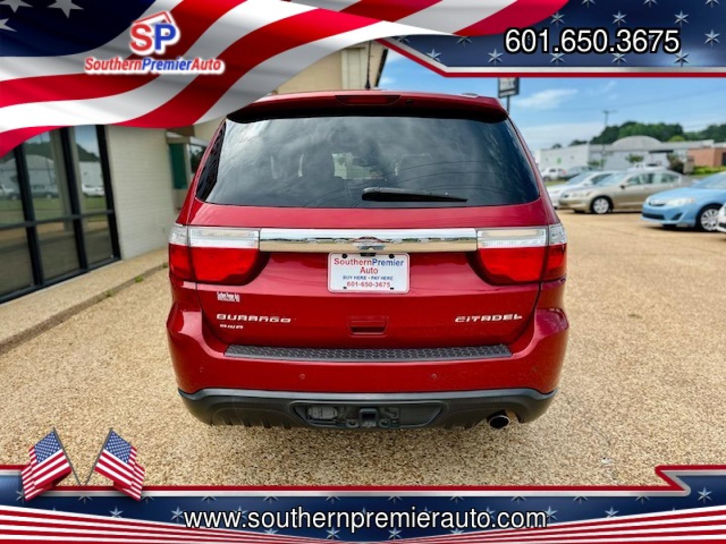 2011 RED DODGE DURANGO BOULEVARD (C (1D4RE5GG2BC) , located at 922 W. Beacon St., Philadelphia, MS, 39350, (601) 650-3675, 32.770447, -89.127151 - Photo#4